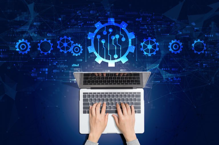 Automation concept with person using laptop